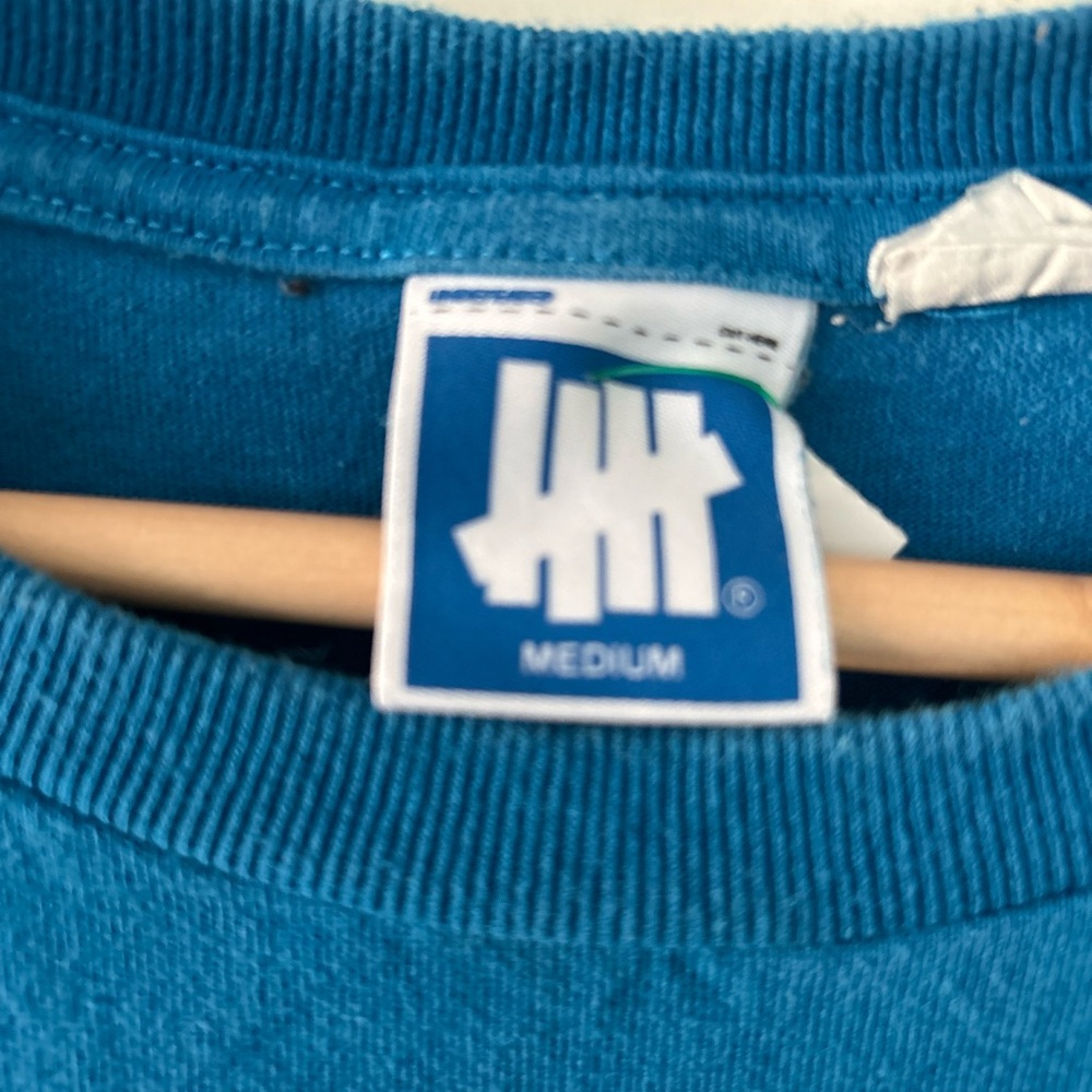 UNDEFEATED pocket tee